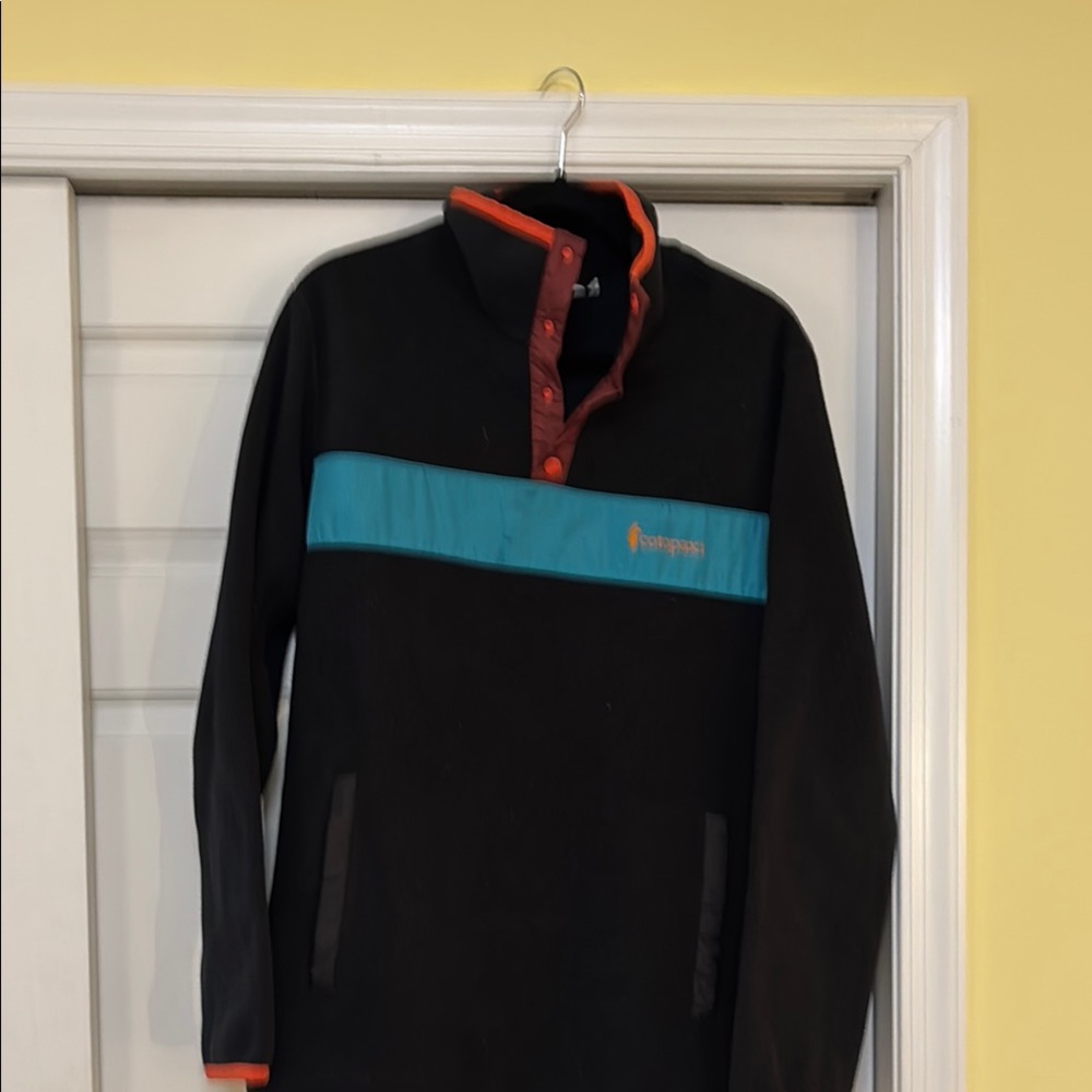 Cotopaxi Black Fleece with Orange and Teal Trim